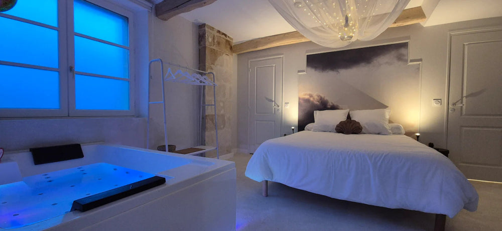 La tête dans les nuages - Love’nSpa - weekend en amoureux, love rooms avec spa ou jacuzzi privatif1 de La tête dans les nuages
